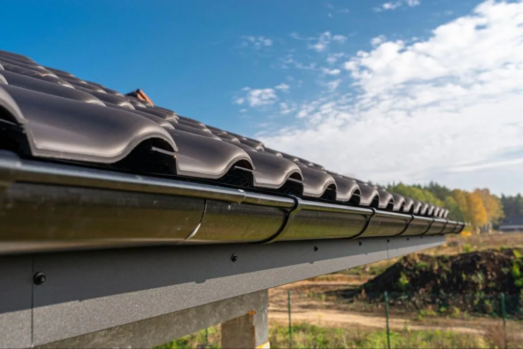 Gutters on a shingle roof. 